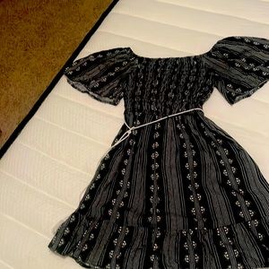 black and white pattern dress off the shoulder with white tie